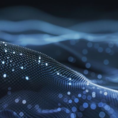 An image showing a vibrant blue abstract background with blurred lights, creating a mesmerizing visual effect, Abstract background with a multitude of tiny, scattered dots, AI Generated