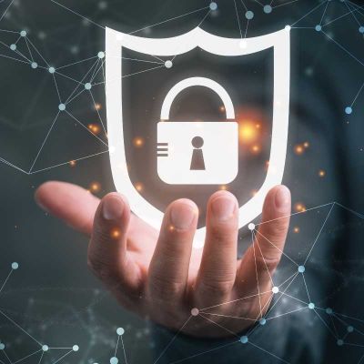 Hand holding cybersecurity virtual lock