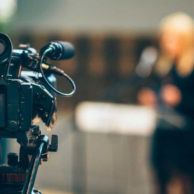 Media professionals being filmed